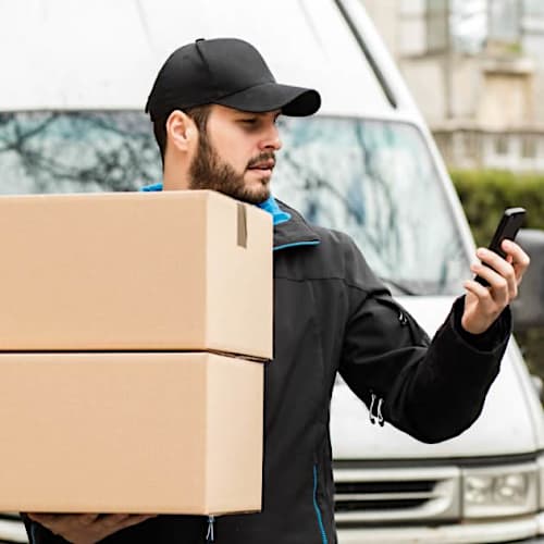 KSEDCO 1626352949 Shutterstock 609236609 Delivery Man W Phone V3 installation for Georgia facilities